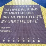 The saying as you walk into the Pool Area by Winston Churchill, "We Make A Living By What We Get But Make A Life By What We Give"